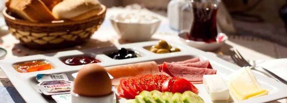 Monte Cappa Cave House Bed & Breakfast Ürgüp Bagian luar foto